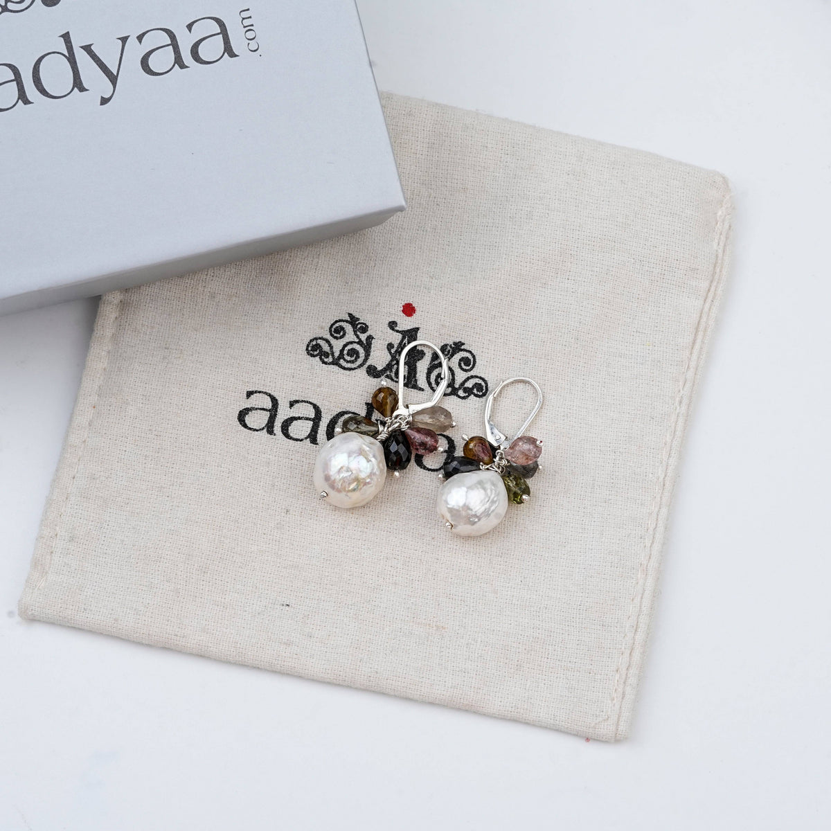 Detailed view of Tourmaline Bunch & Pearl Silver Earrings highlighting natural tourmaline bunches, pearl accents, handcrafted silverwork, and polished finish