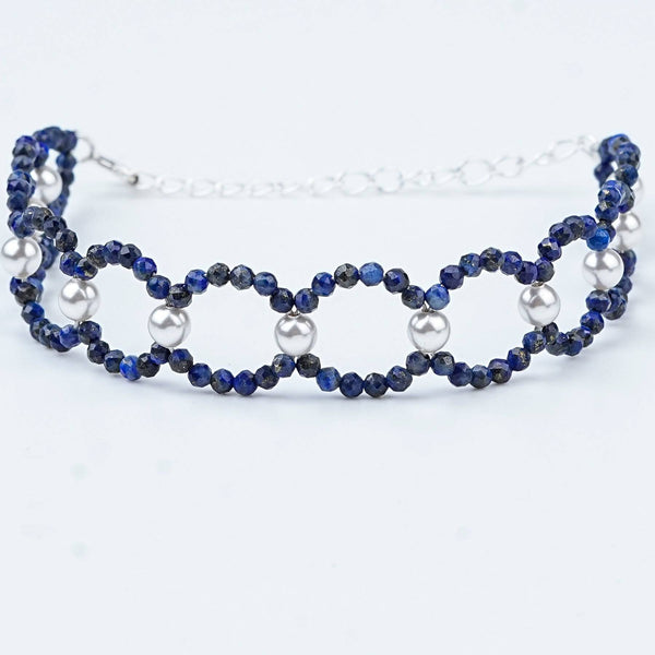 Close-up of Lapis Lazuli & Pearl Silver Bracelet showcasing natural lapis lazuli, lustrous pearls, and intricate handmade silver craftsmanship