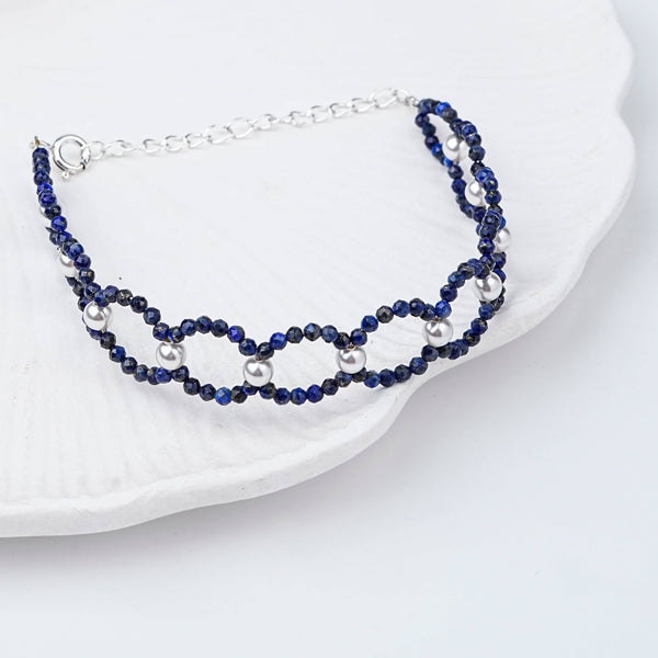 Angled view of Lapis Lazuli & Pearl Silver Bracelet in 92.5 sterling silver with lapis lazuli and pearl detailing