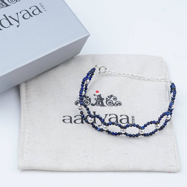 Detailed view of Lapis Lazuli & Pearl Silver Bracelet highlighting natural lapis lazuli stones, pearl accents, handcrafted silverwork, and polished finish