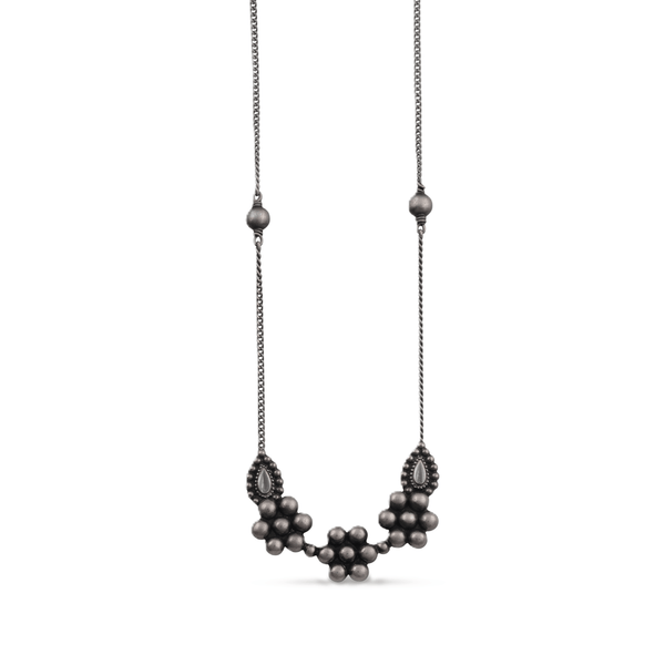 Sterling silver necklace with bead and teardrop pendant design