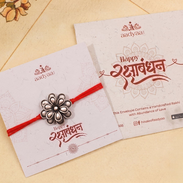 Handcrafted Silver Rakhi/Pendant: Double Flower