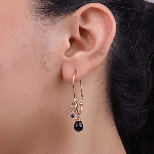 Model wearing brass fashion earrings for a stylish and contemporary fashion jewelry look