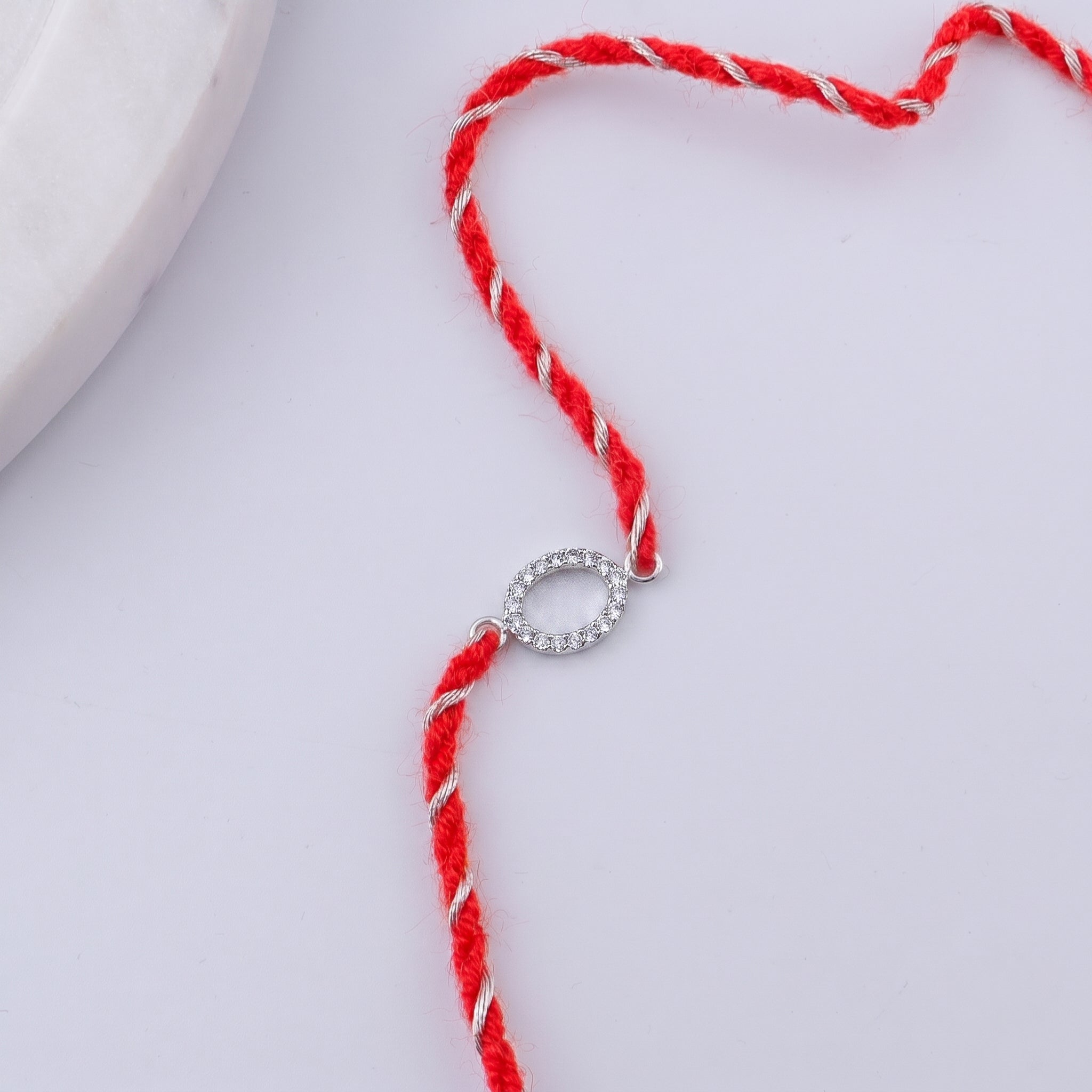 Hollow Oval Pave Silver CZ Rakhi