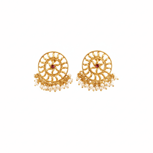Front view of Sun Pearl Earrings in 92.5 silver with 22K gold plating and luminous pearl centerpiece