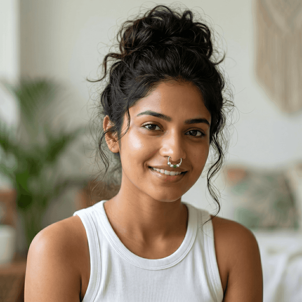 Model wearing Silver Septum Cum Nose Ring with Green & White Bead for a traditional and elegant jewellery look