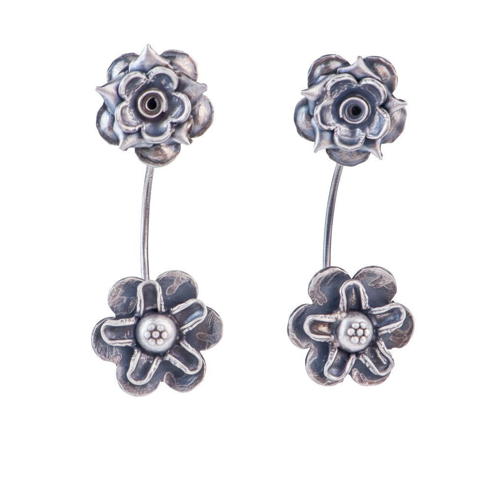 Oxidized dual flower earrings in 92.5 sterling silver