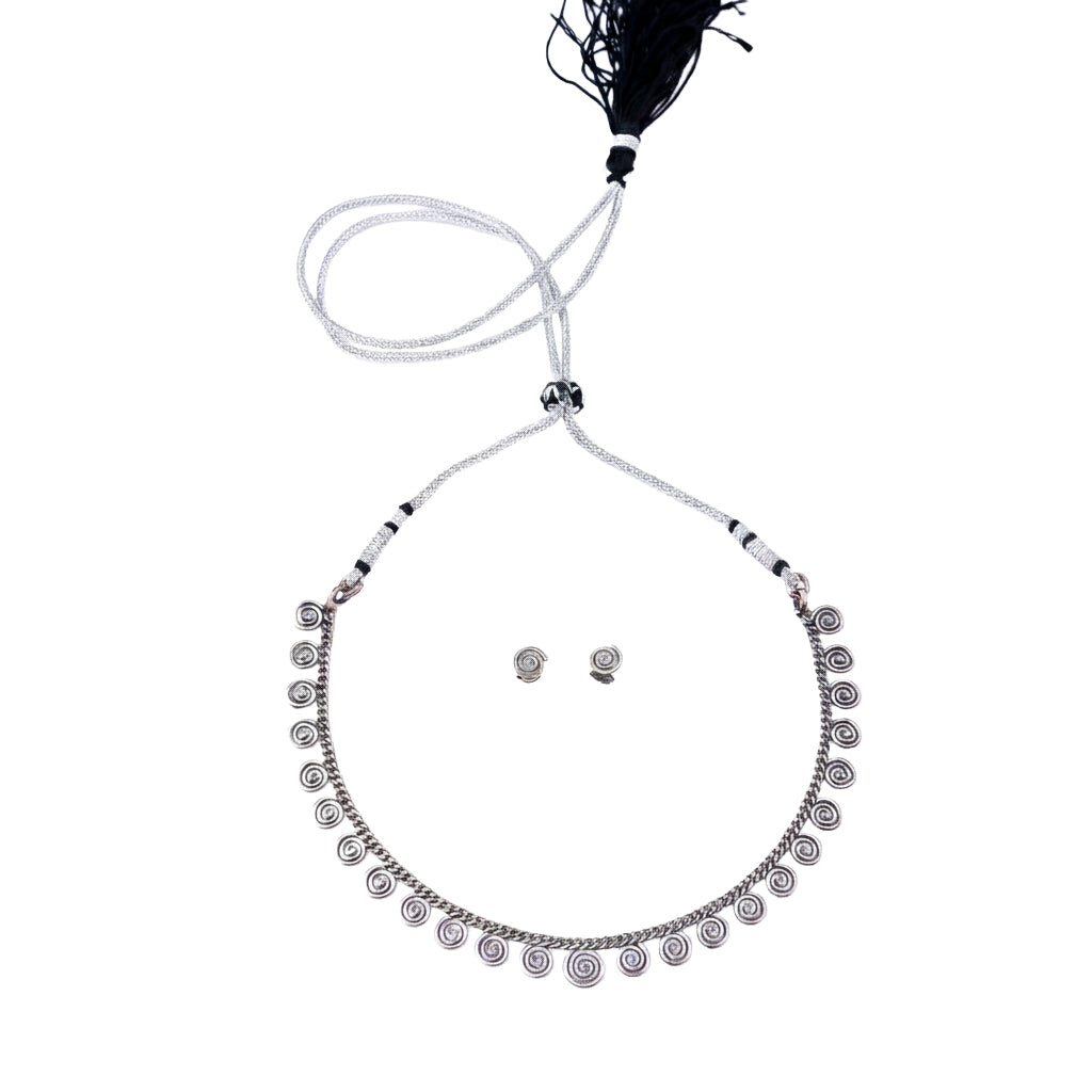 Silver spiral jewelry set with earrings and necklace