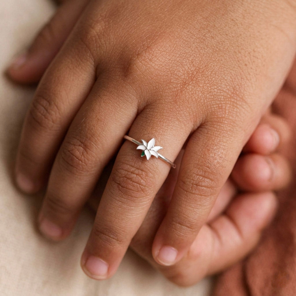 Model wearing White Lily enamel ring on finger