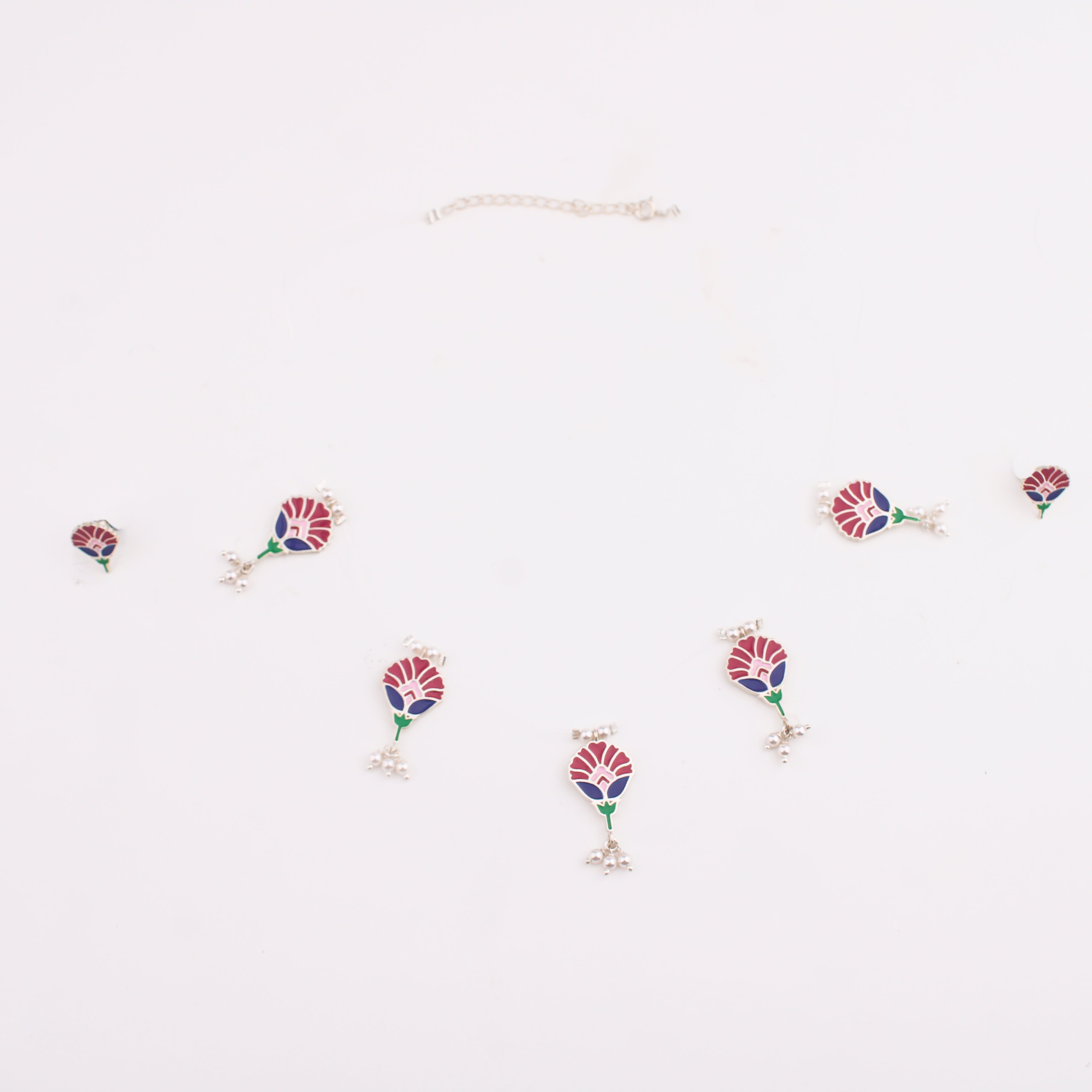 Meena charm set with invisible thread
