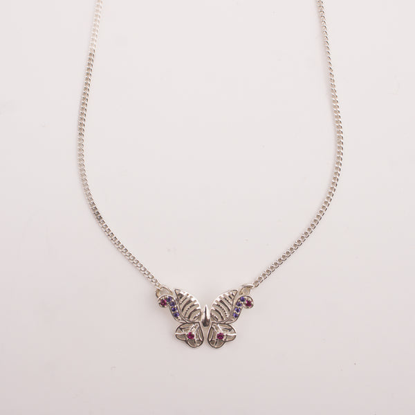 Elegant silver butterfly pendant necklace on model