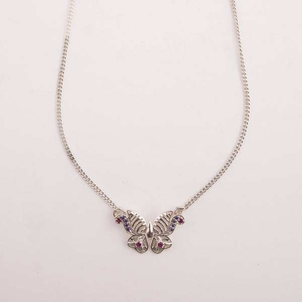 Elegant silver butterfly pendant necklace on model