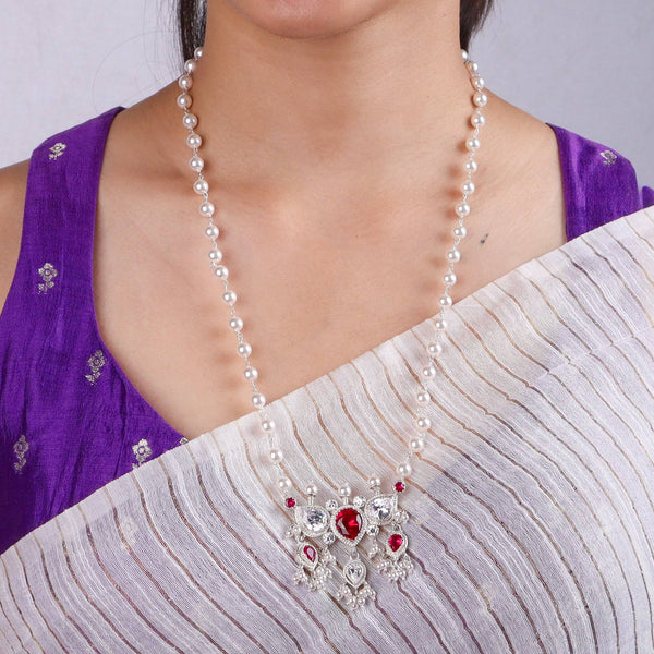 Model wearing Silver Pink & White CZ Tanmani Set with Pearl Ganthan for an elegant traditional jewellery look