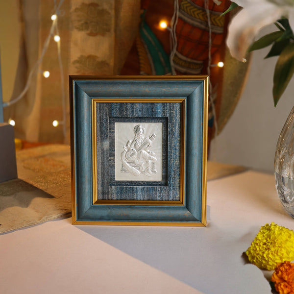 Silver Saraswati Devi frame with wooden finish for home decor