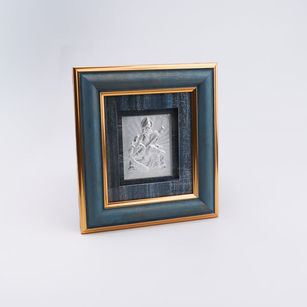 Elegant silver Saraswati Devi picture frame with blue and gold accents
