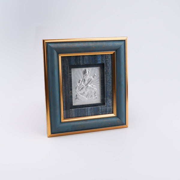 Elegant silver Saraswati Devi picture frame with blue and gold accents