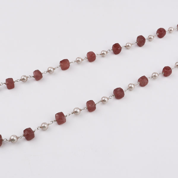 Flat lay of Silver Soorajmukhi Pendant Pink Strawberry Cubes