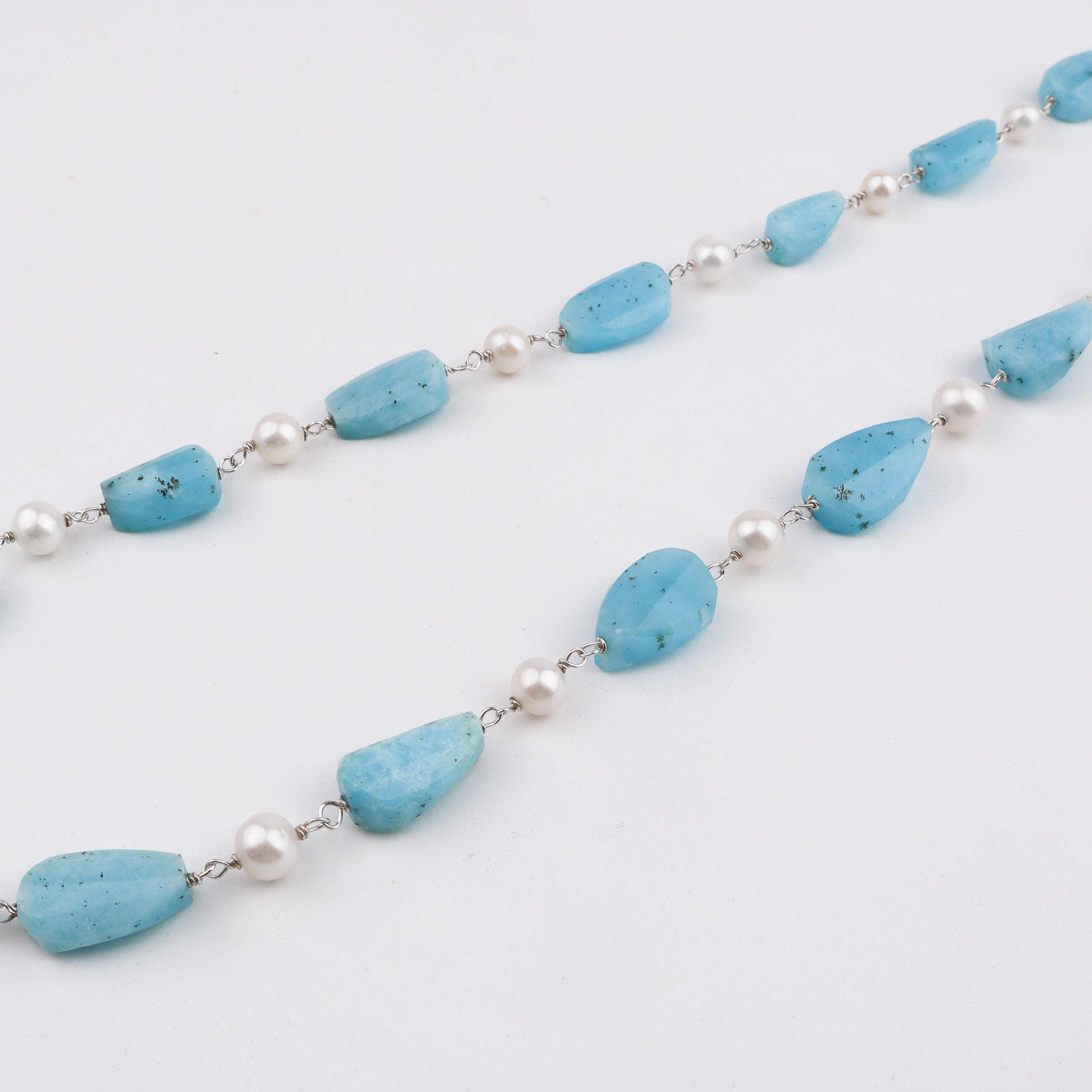 Silver Soorajmukhi Pendant Fancy Larimar Stones
