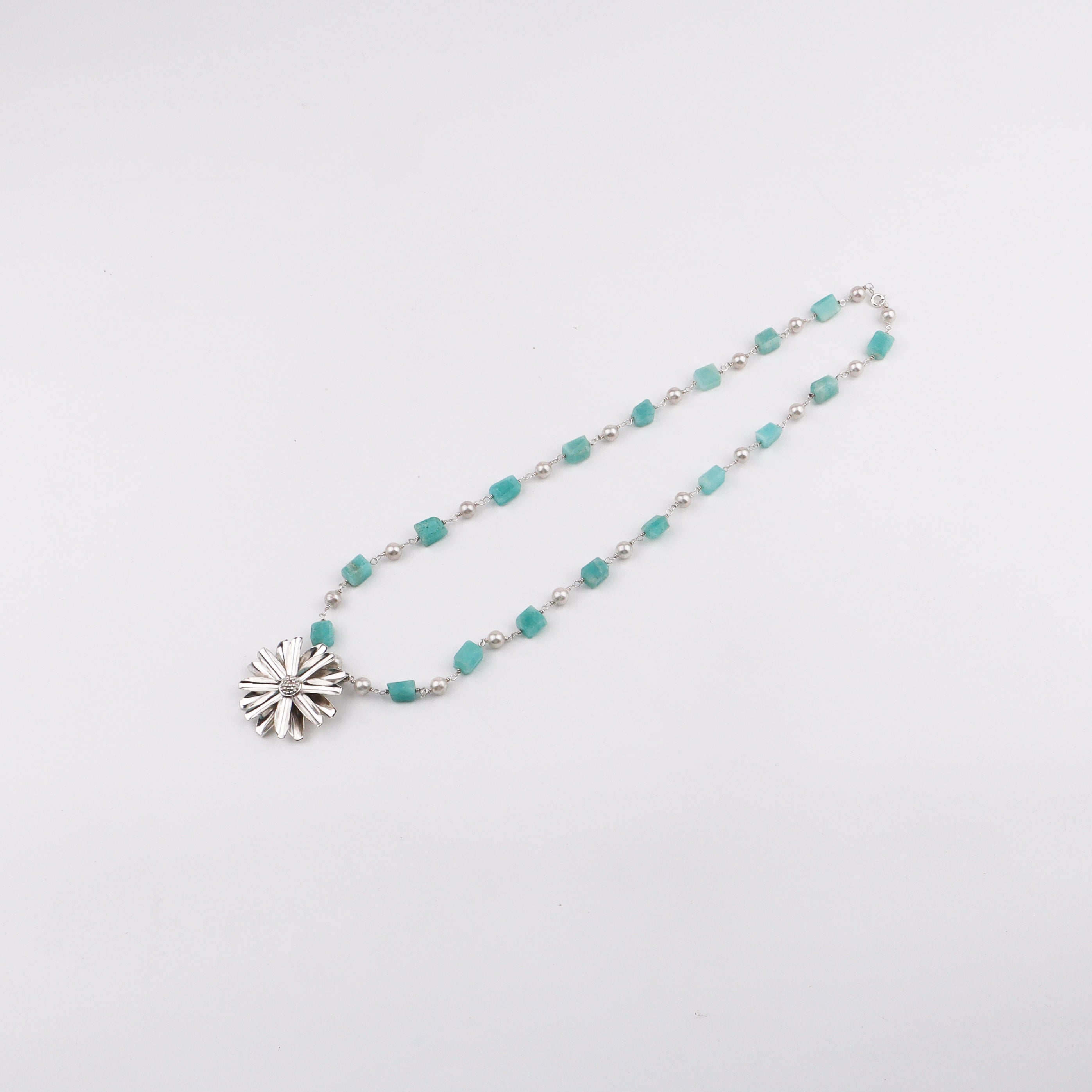 Silver Soorajmukhi Pendant Blue Amezonite Stones