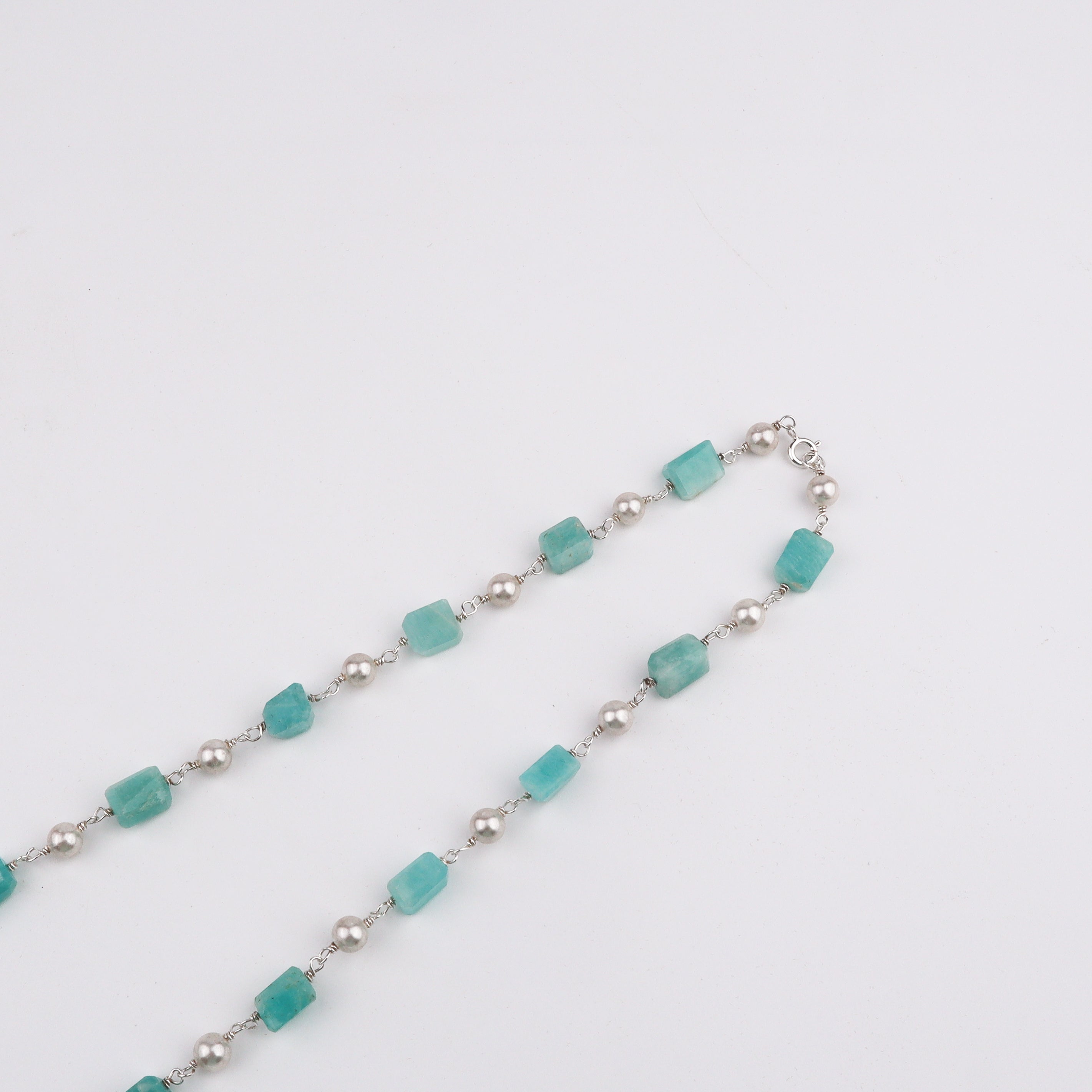 Silver Soorajmukhi Pendant Blue Amezonite Stones