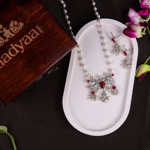 Close-up of Silver Pink & White CZ Tanmani Set showcasing pink and white CZ stones with intricate silver craftsmanship and pearl Ganthan