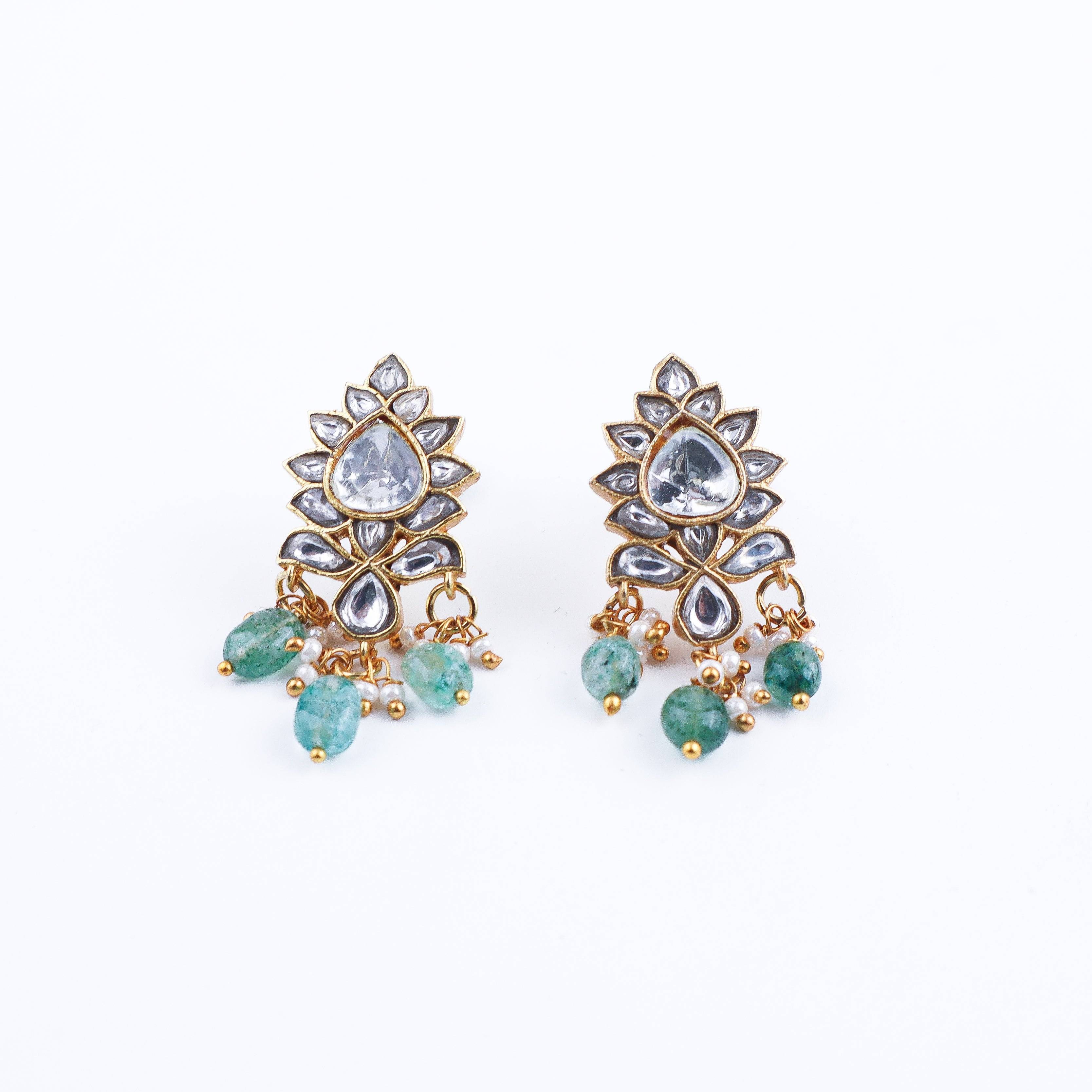 Detailed view of a 22K gold-plated fashion earring highlighting intricate motifs, textured detailing, and premium 22K gold-plated finish