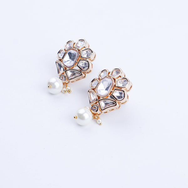 Angled view of a 22K gold-plated fashion earring highlighting its elegant silhouette, structure, and polished gold finish