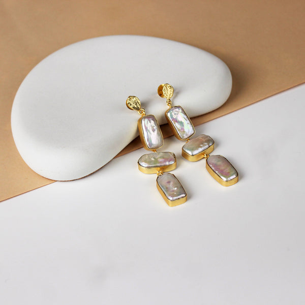 Close-up of 22K gold-plated fashion earring showcasing intricate detailing, fine craftsmanship, and rich 22K gold plating