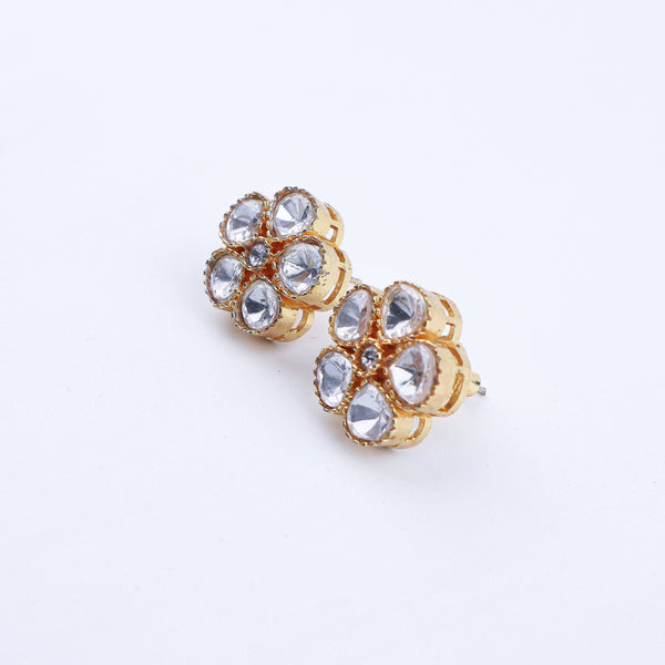 Angled view of a 22K gold-plated fashion earring highlighting its elegant silhouette, structure, and polished gold finish