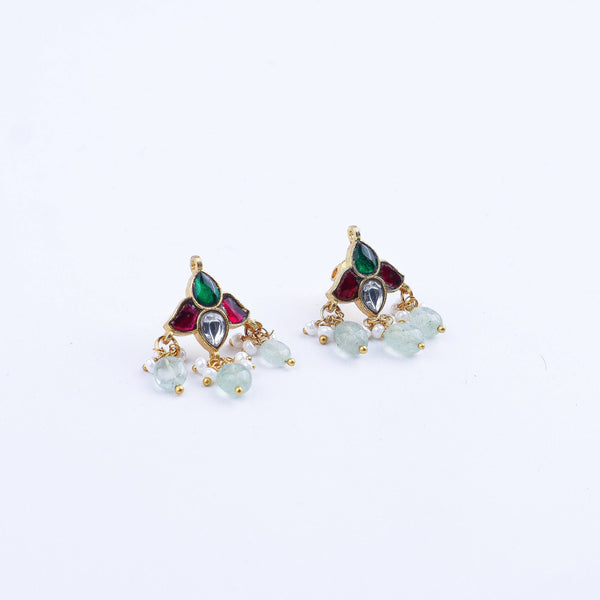 Angled view of a 22K gold-plated fashion earring highlighting its elegant silhouette, structure, and polished gold finish