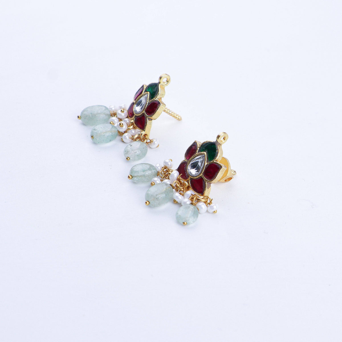 Angled view of a 22K gold-plated fashion earring highlighting its elegant silhouette, structure, and polished gold finish