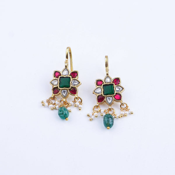 Angled view of a 22K gold-plated fashion earring highlighting its elegant silhouette, unique structure, and polished gold finish