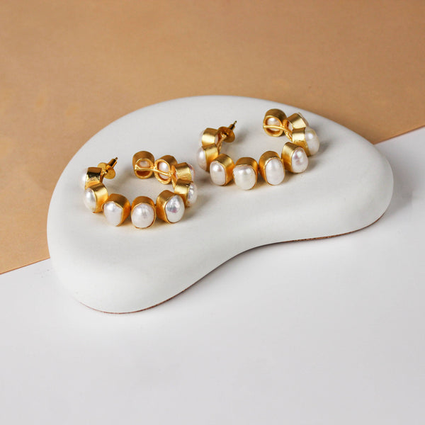 Close-up of a 22K gold-plated fashion earring showcasing intricate detailing, fine craftsmanship, and rich 22K gold plating