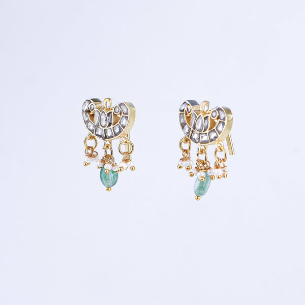 Angled view of a 22K gold-plated fashion earring highlighting its elegant silhouette, structure, and polished gold finish