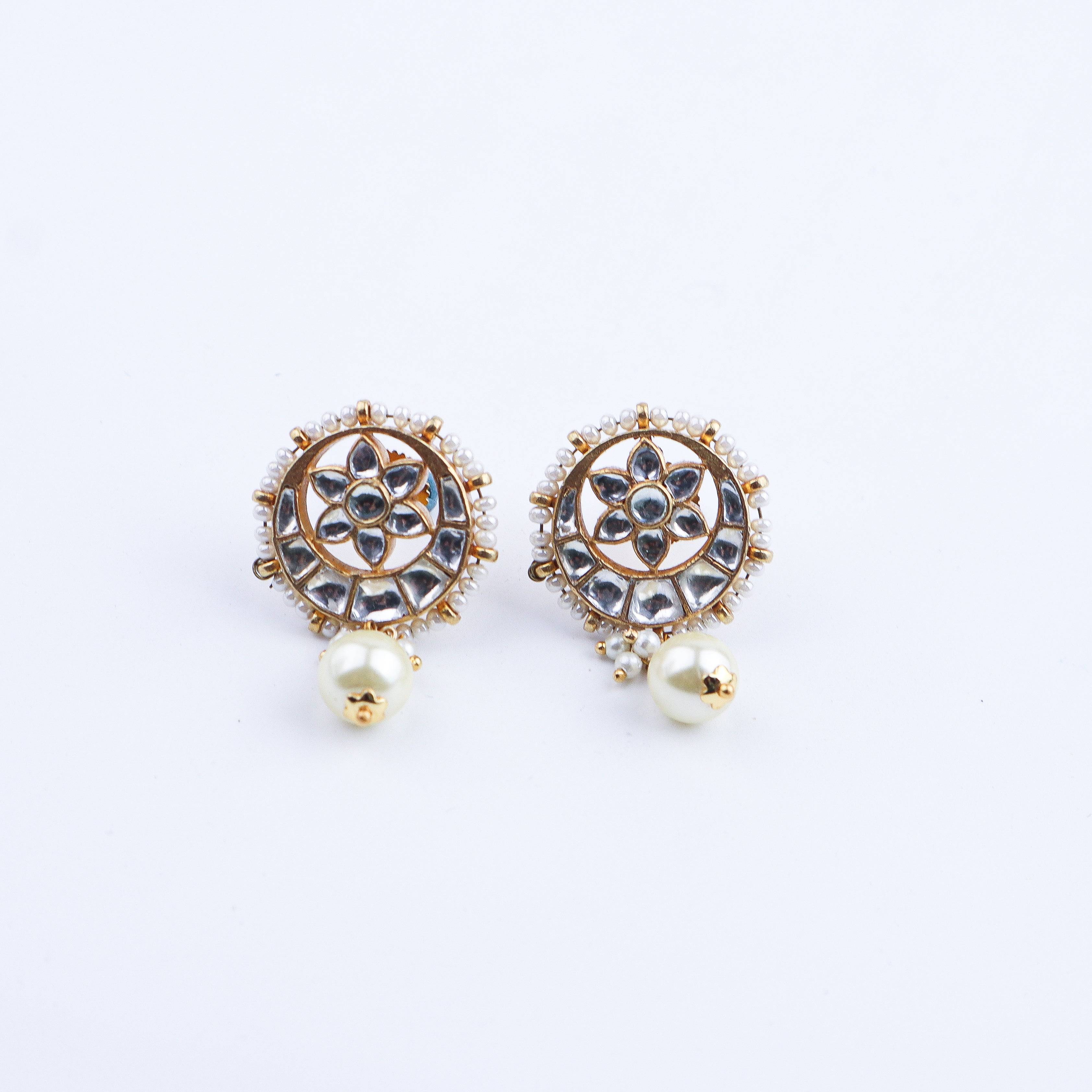 Detailed view of a 22K gold-plated fashion earring highlighting intricate motifs, textured detailing, and premium 22K gold-plated finish