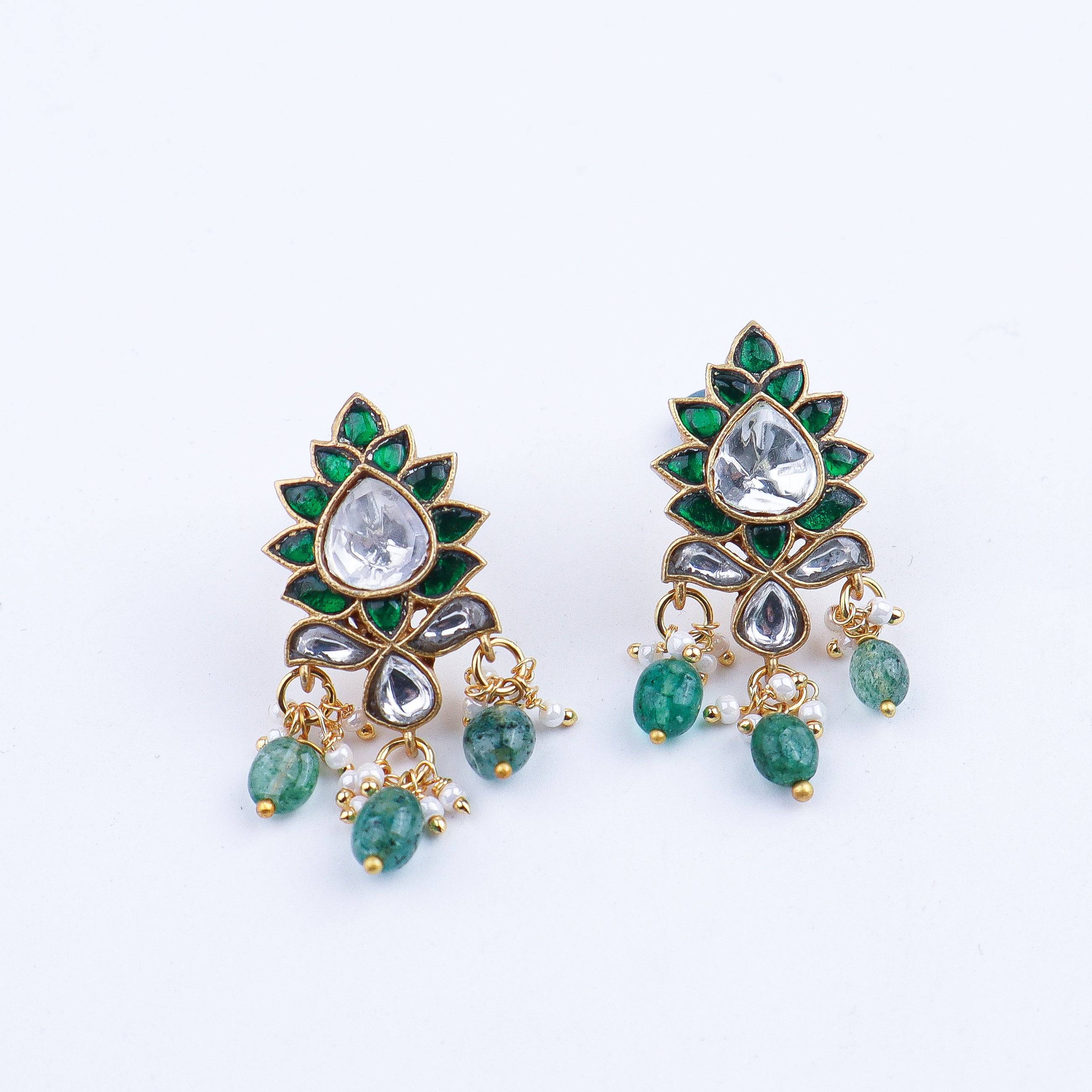 Detailed view of a 22K gold-plated fashion earring highlighting intricate motifs, textured detailing, and premium 22K gold-plated finish