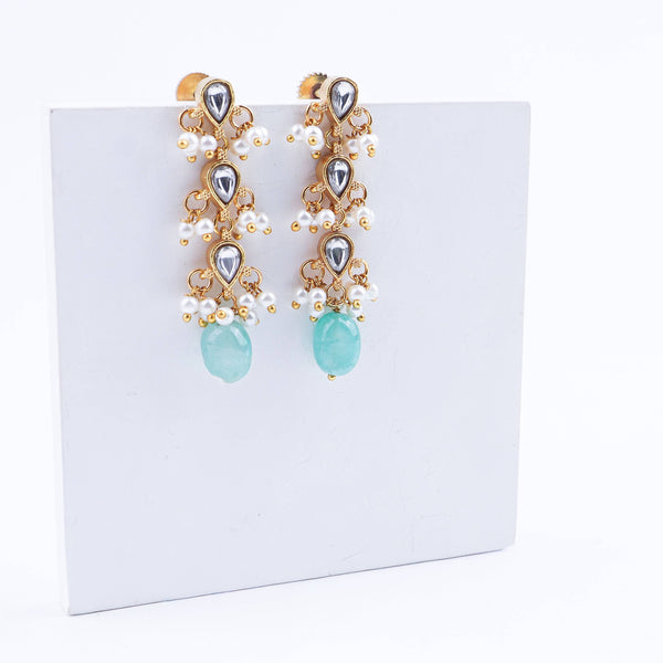 Detailed view of a 22K gold-plated fashion earring highlighting intricate motifs, textured detailing, and a premium 22K gold-plated finish
