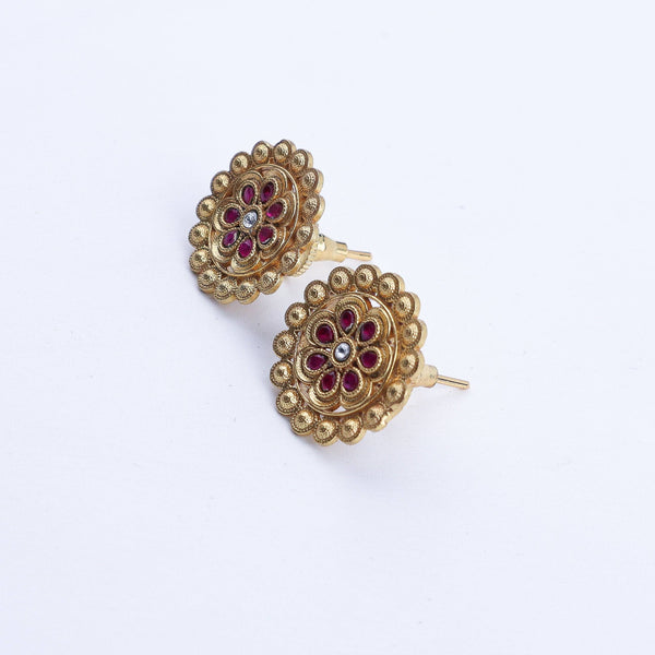 Angled view of a 22K gold-plated fashion earring highlighting its elegant silhouette, structure, and polished gold finish