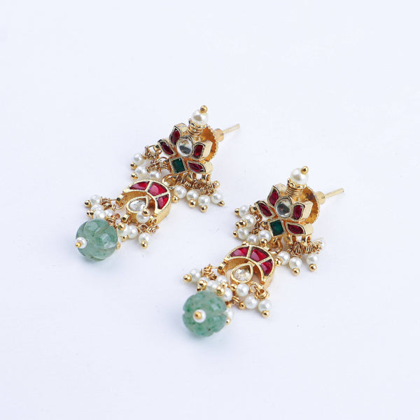 Angled view of a 22K gold-plated fashion earring highlighting its elegant silhouette, structure, and polished gold finish