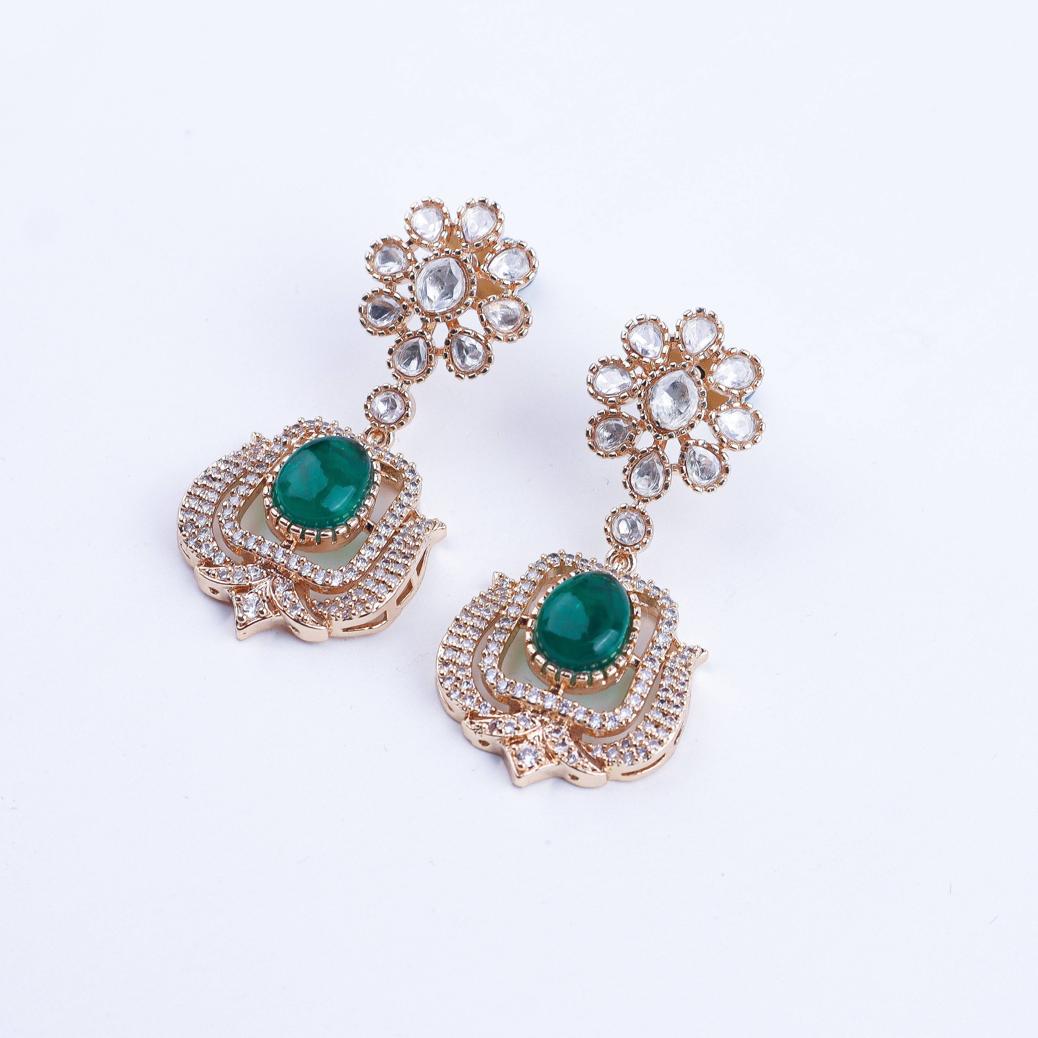 Angled view of a 22K gold-plated fashion earring highlighting its elegant silhouette, structure, and polished gold finish