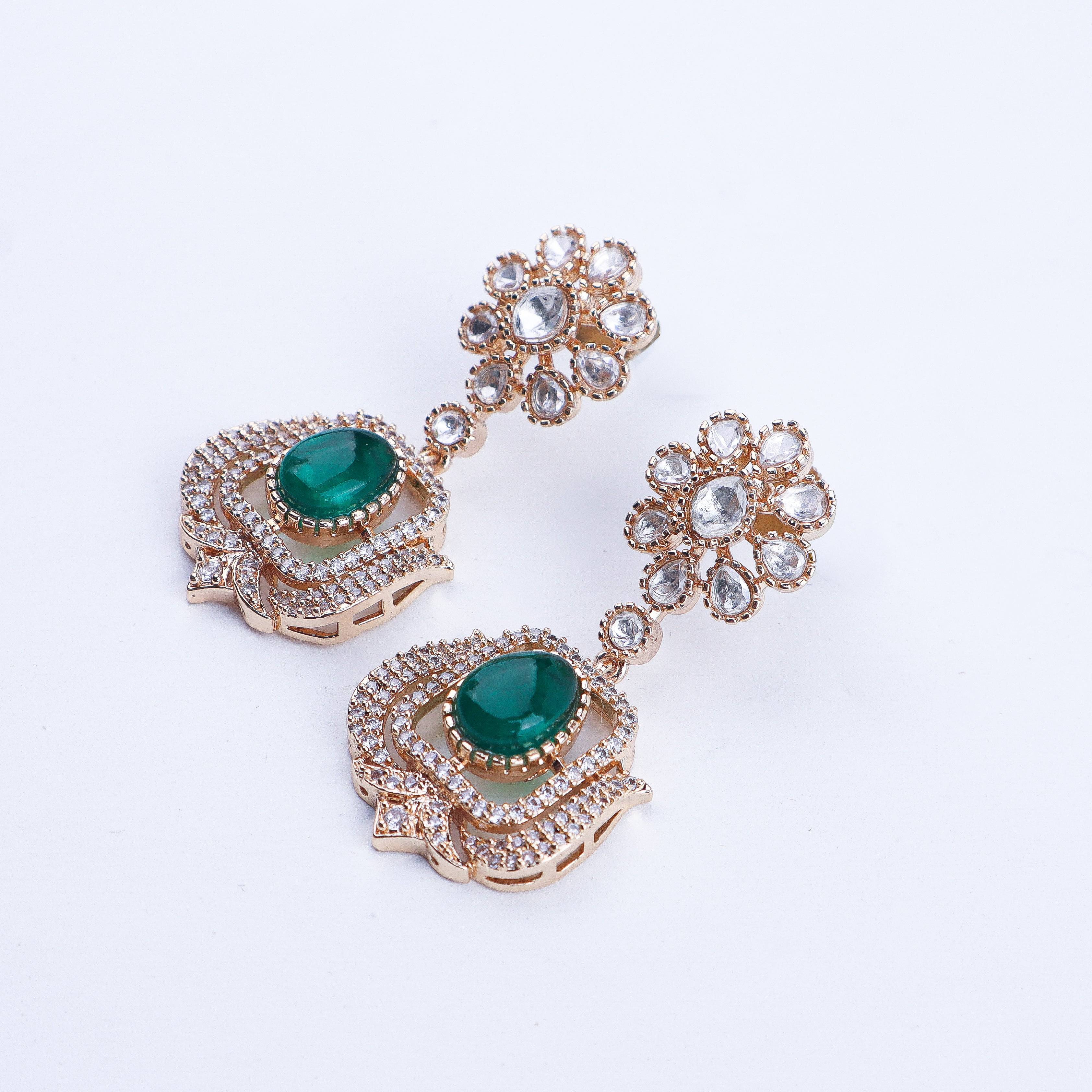 Angled view of a 22K gold-plated fashion earring highlighting its elegant silhouette, structure, and polished gold finish
