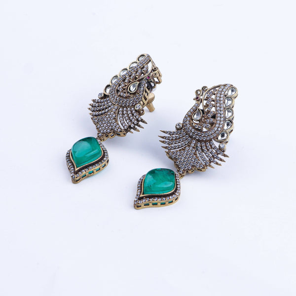 Detailed view of a 22K gold-plated fashion earring highlighting intricate motifs, textured detailing, and a premium 22K gold-plated finish