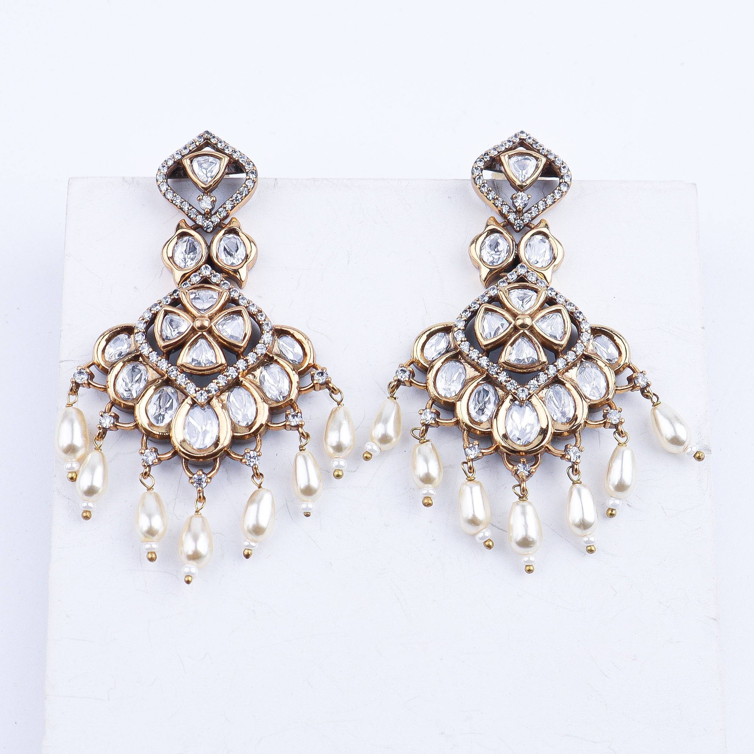 Close-up of a 22K gold-plated fashion earring showcasing intricate detailing, fine craftsmanship, and rich 22K gold plating
