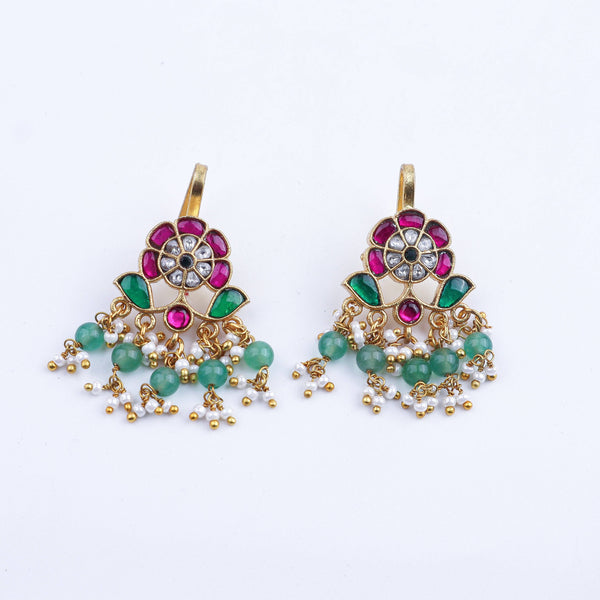 Close-up of a 22K gold-plated fashion earring showcasing intricate detailing, fine craftsmanship, and rich 22K gold plating