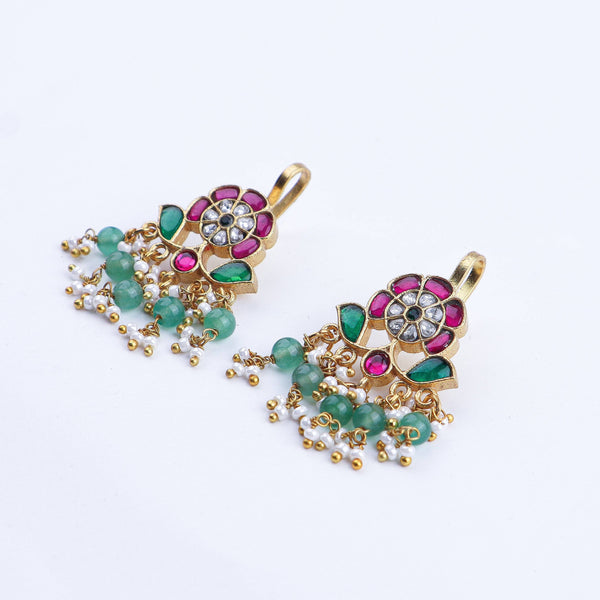 Angled view of 22K gold-plated fashion earring highlighting its elegant silhouette, structure, and polished gold finish