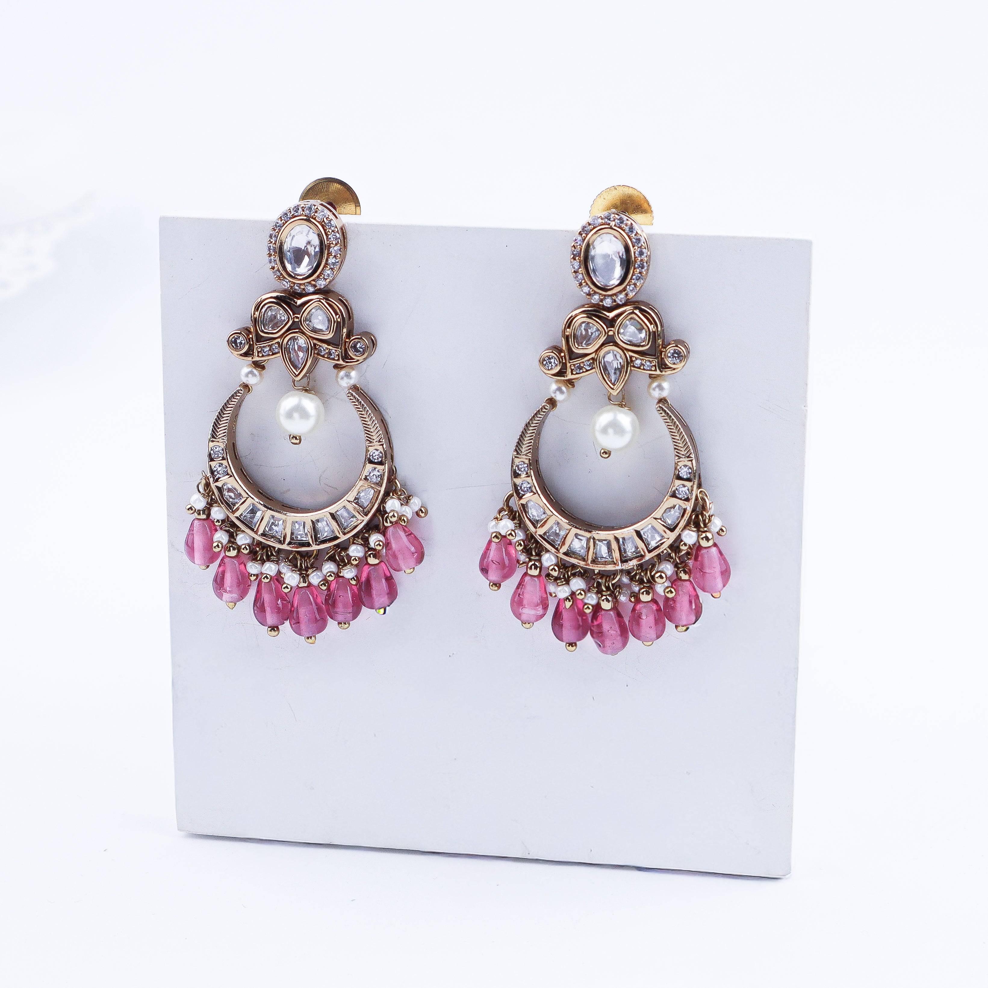 Detailed view of a 22K gold-plated fashion earring highlighting intricate motifs, textured detailing, and premium 22K gold-plated finish