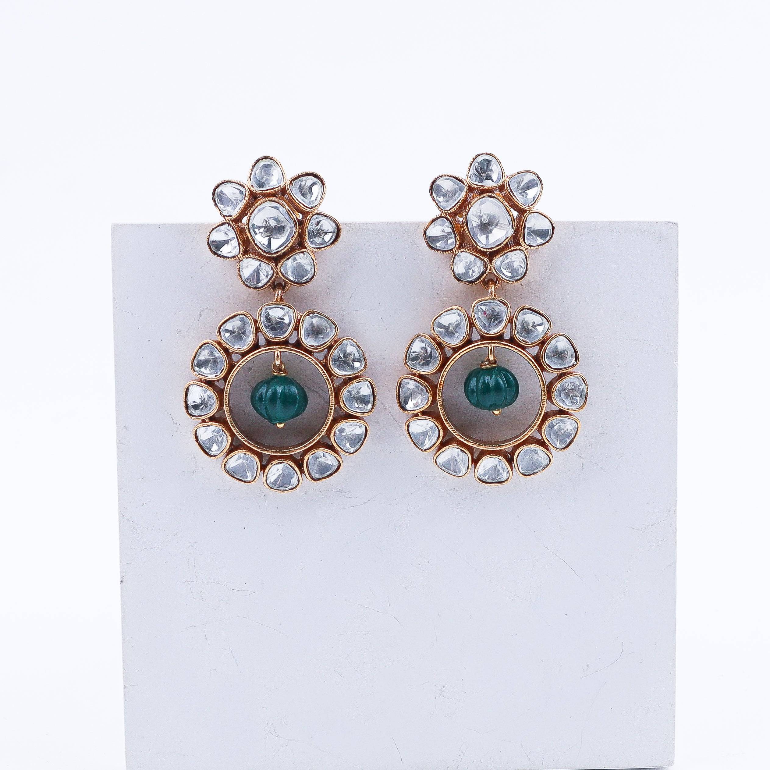 Close-up of a 22K gold-plated fashion earring showcasing intricate detailing, fine craftsmanship, and rich 22K gold plating