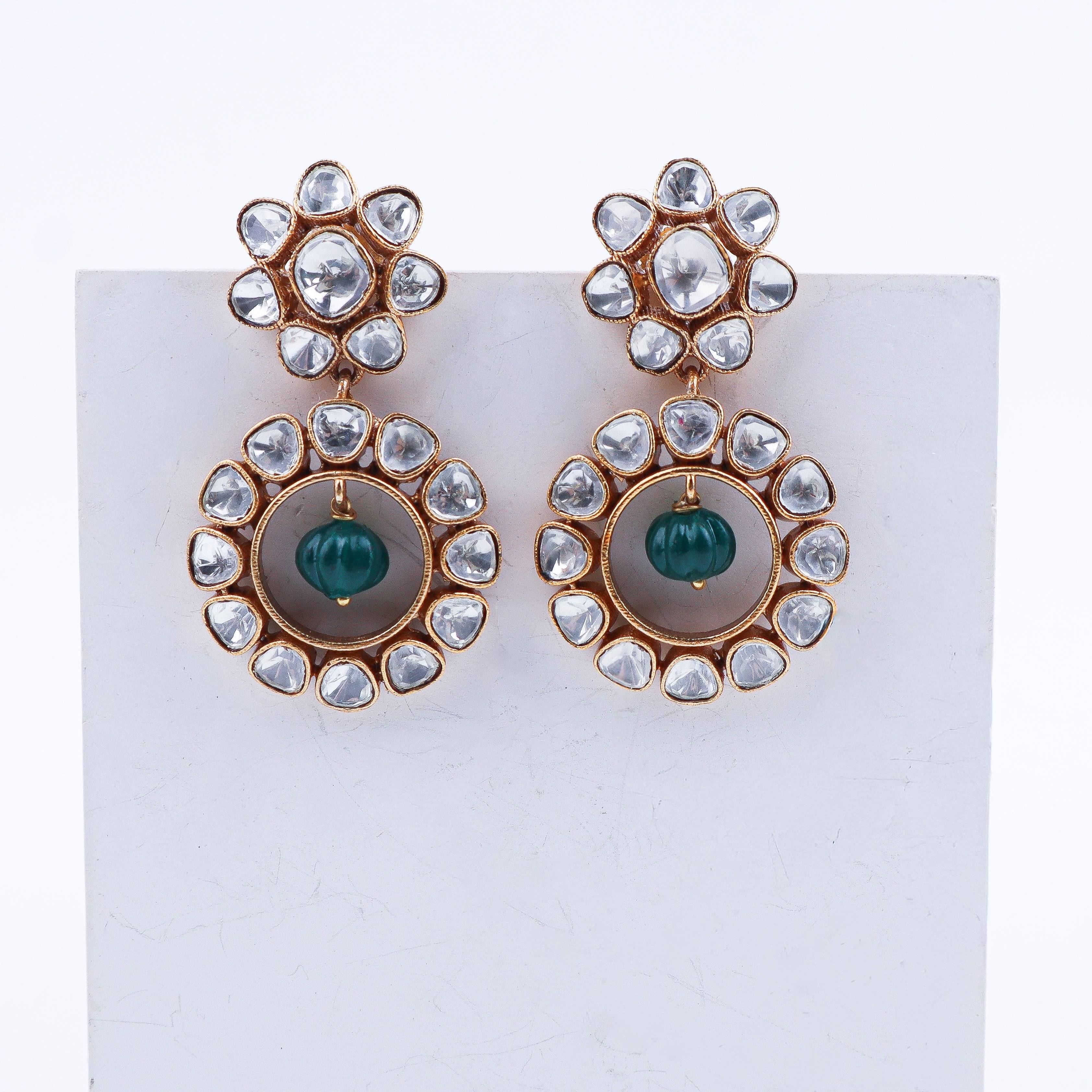 Detailed view of a 22K gold-plated fashion earring highlighting intricate motifs, textured detailing, and premium 22K gold-plated finish
