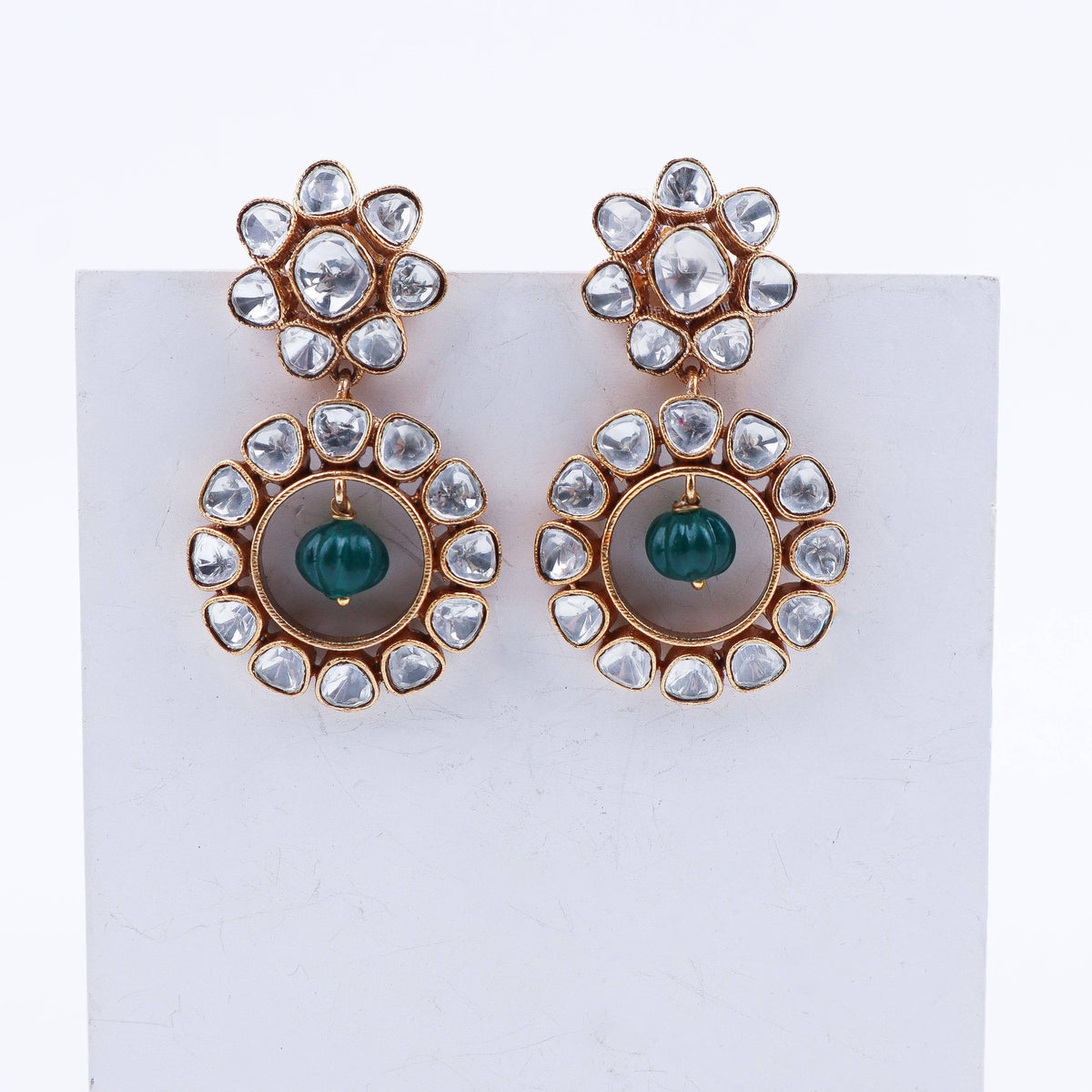 Detailed view of a 22K gold-plated fashion earring highlighting intricate motifs, textured detailing, and premium 22K gold-plated finish
