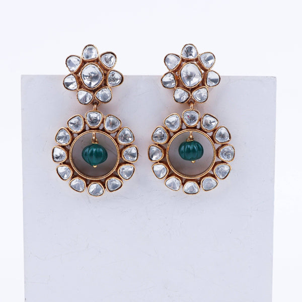 Detailed view of a 22K gold-plated fashion earring highlighting intricate motifs, textured detailing, and premium 22K gold-plated finish